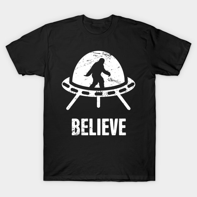 BELIEVE | Bigfoot In An Alien UFO T-Shirt by MeatMan